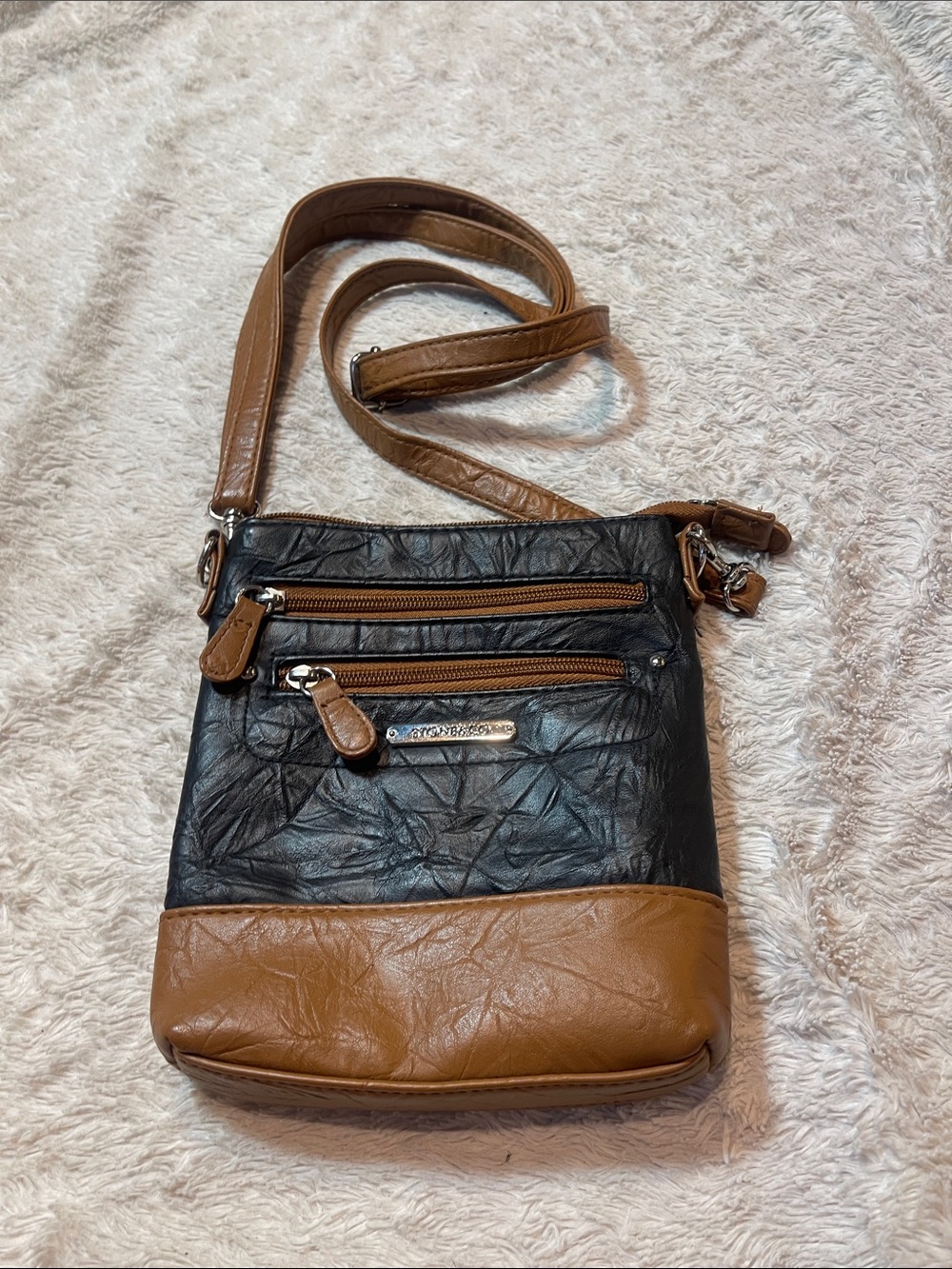 Stone & co Two-Tone Black and Tan Crossbody Bag with Front Zip Pockets